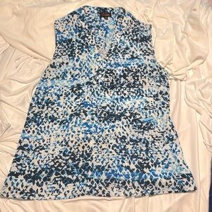 Super cute top that is very versatile.